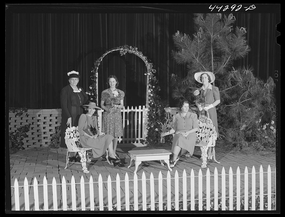 The committee in charge of a flower show held in Greensboro school auditorium. Greene County, Georgia. Sourced from the…