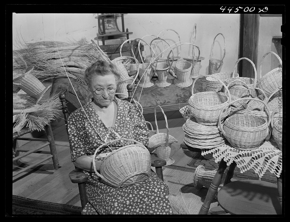 Mrs. Wilson carries on the basket weaving tradition of her family. Penfield, Greene County, Georgia. Sourced from the…