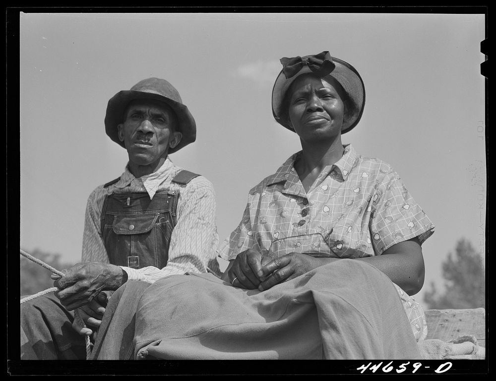  couple going to town on Saturday afternoon. Greene County, Georgia. Sourced from the Library of Congress.