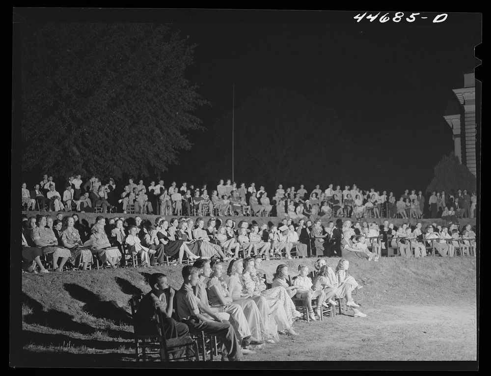 Audience at the outdoor graduation of the Union Point high school. Union Point, Greene County, Georgia. Sourced from the…