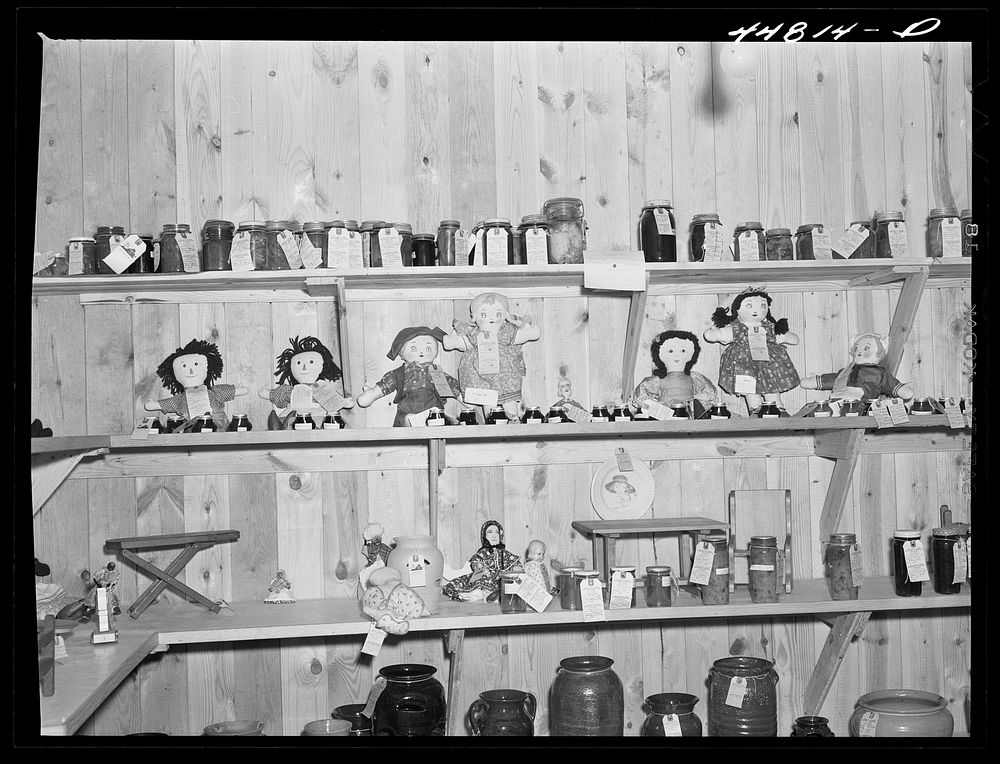 A display of preserves and handmade dolls at the Virginia crafts co-op on U. S. Highway No. 1, twenty miles north of…