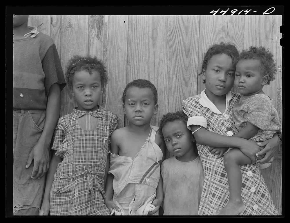 Some of the children of a family of ten who must move out of the area being taken over by the Army in Caroline County…