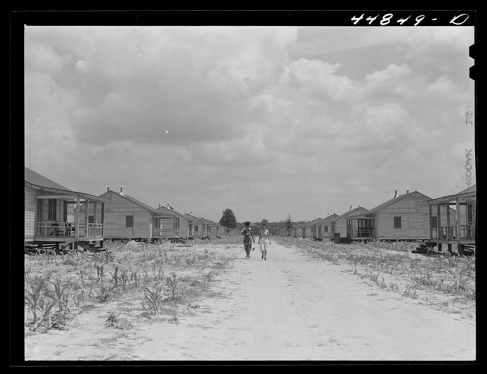 [Untitled photo, possibly related to: Prefabricated houses built by FSA (Farm Security Administration) to take care of some…