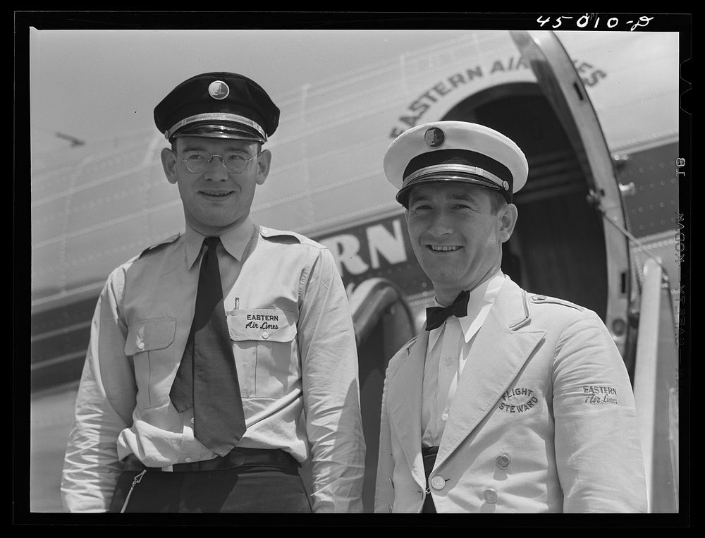 A dispatcher and flight steward. Washington, D.C. municipal airport. Sourced from the Library of Congress.