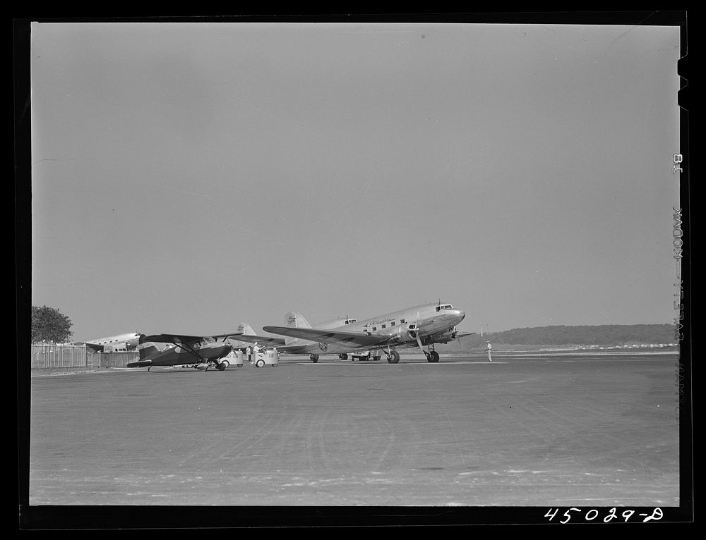 Planes on the field. Washington, D.C. municipal airport. Sourced from the Library of Congress.