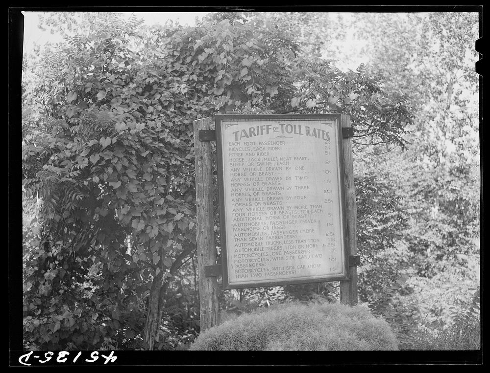 [Untitled photo, possibly related to: Toll rate sign on the New Hampshire side of a bridge across the Connecticut River near…