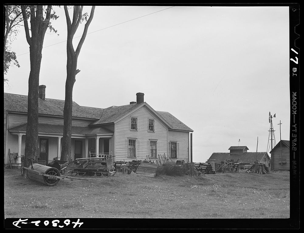[Untitled photo, possibly related to: The O'Connell homestead in the Pine Camp expansion area. The articles outside the…