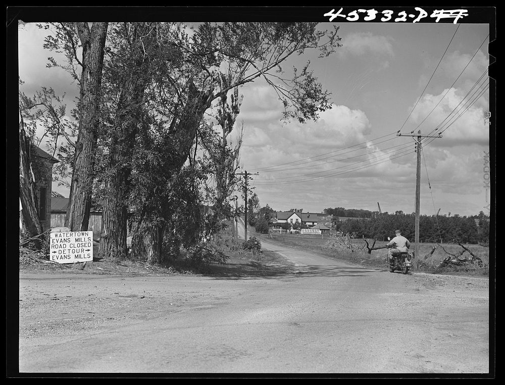Messenger from Pine Camp drives through the newly acquired expansion area. Watertown, New York. Sourced from the Library of…