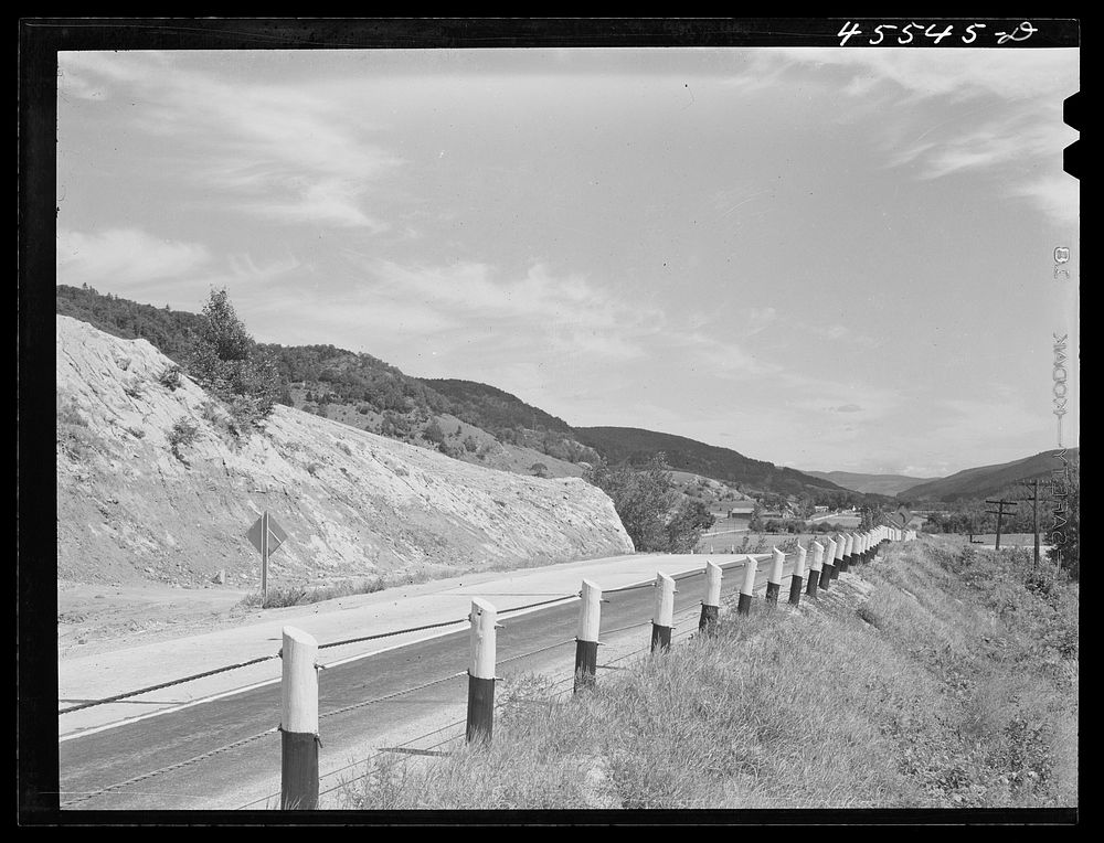 Highway between Montpelier and Burlington, about fifteen miles from Burlington, Vermont. Sourced from the Library of…