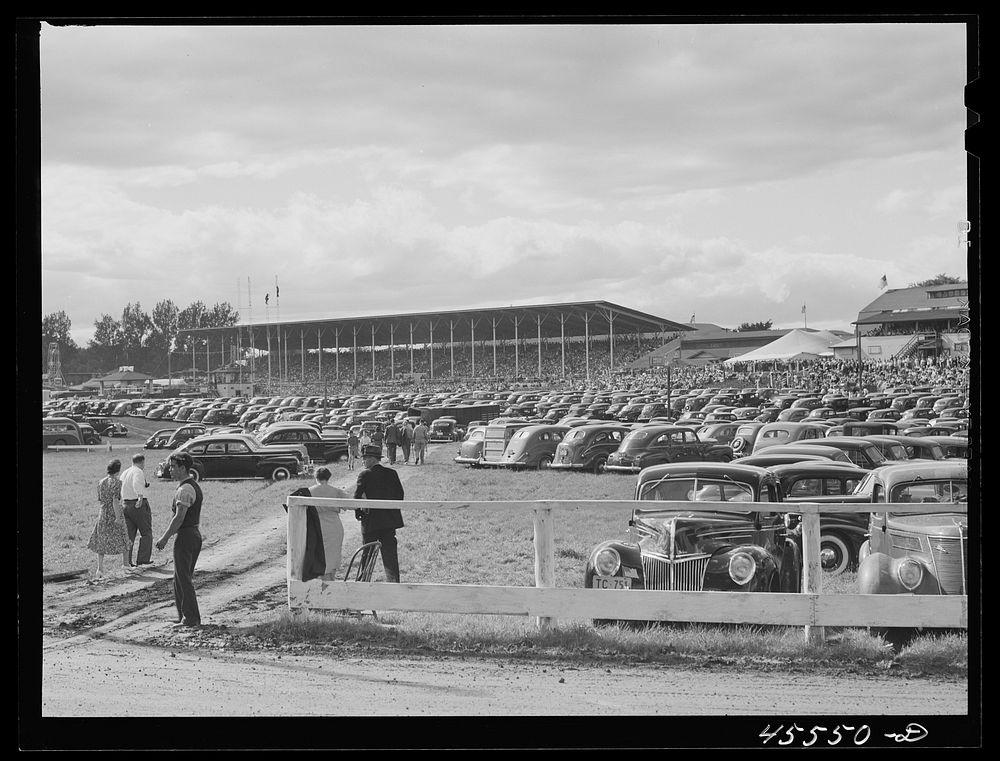 Grandstand and parked cars at the Rutland Fair. Vermont. Sourced from the Library of Congress.