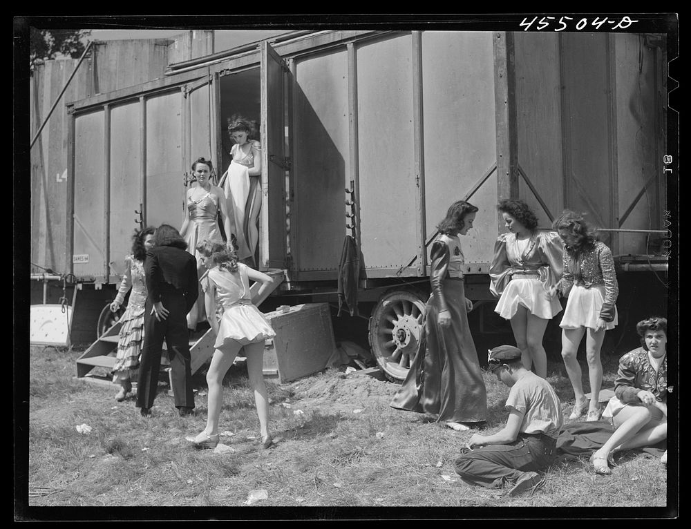 "Backstage" of the "girlie" show at the Rutland Fair. Vermont. Sourced from the Library of Congress.