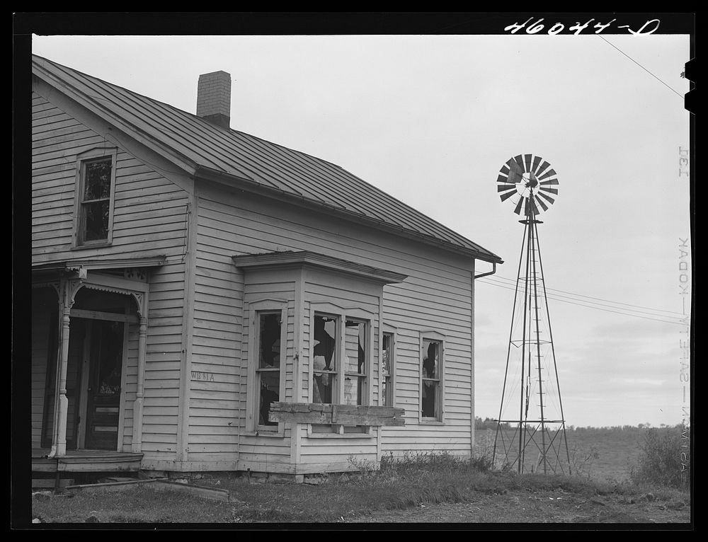 Abandoned house on a road in the Pine Camp expansion area near Leraysville, New York. Sourced from the Library of Congress.
