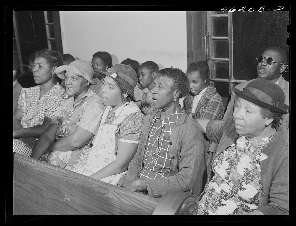 Union Point, Greene County, Georgia. Community sing in the  church. Sourced from the Library of Congress.