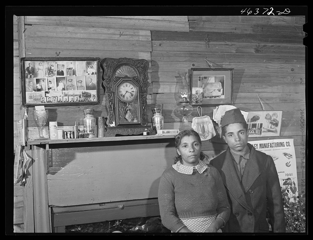 Mrs. Edgar Jones and her son, FSA (Farm Security Administration) clients near Woodville. Her son works at the Civilian…