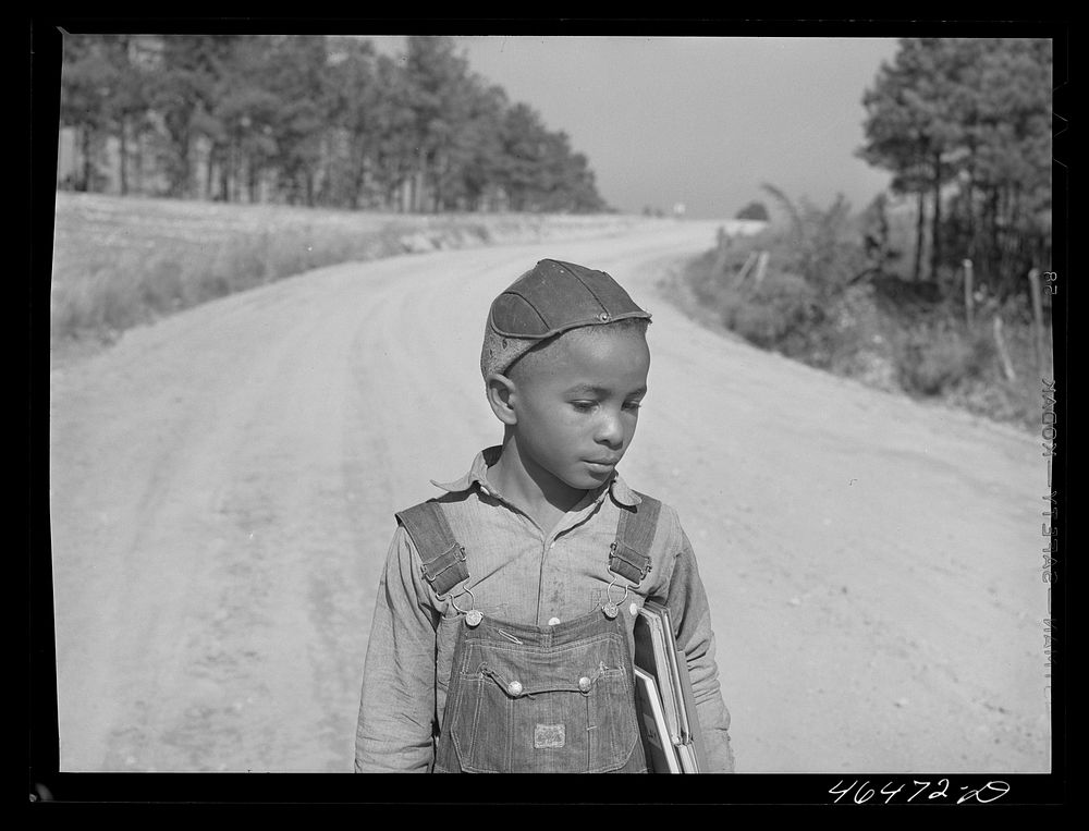 Boyd Jones coming to school at the Alexander community center, Greene County, Georgia. Sourced from the Library of Congress.