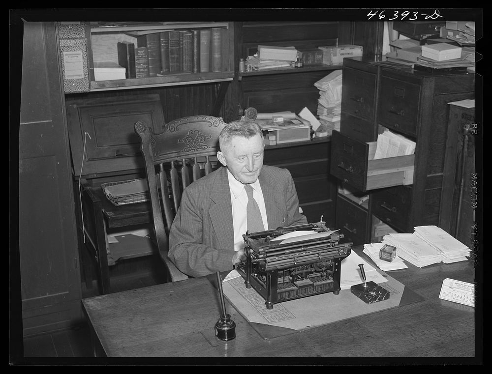 [Untitled photo, possibly related to: Dr. T. Rice, county Historian at work in his office Greensboro, Greene County…