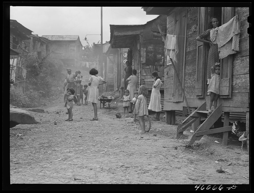 [Untitled photo, possibly related to: Barranquitas, Puerto Rico. Street in slum area]. Sourced from the Library of Congress.