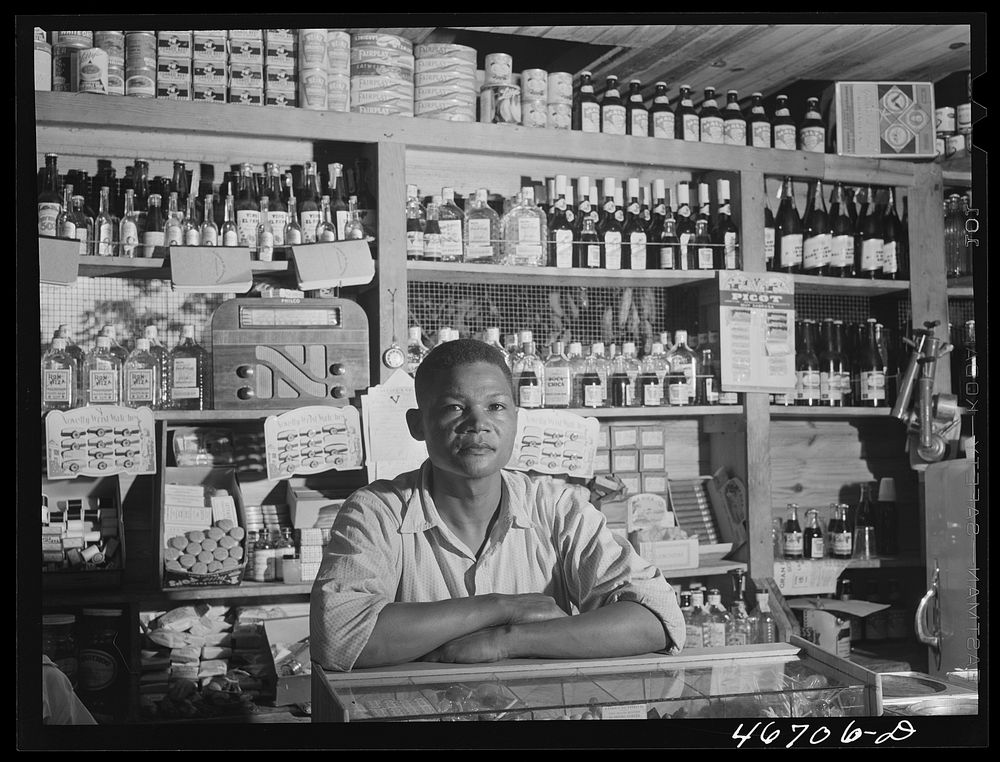 [Untitled photo, possibly related to: Bayamon, Puerto Rico (vicinity). Proprietor of a small general store, which will soon…