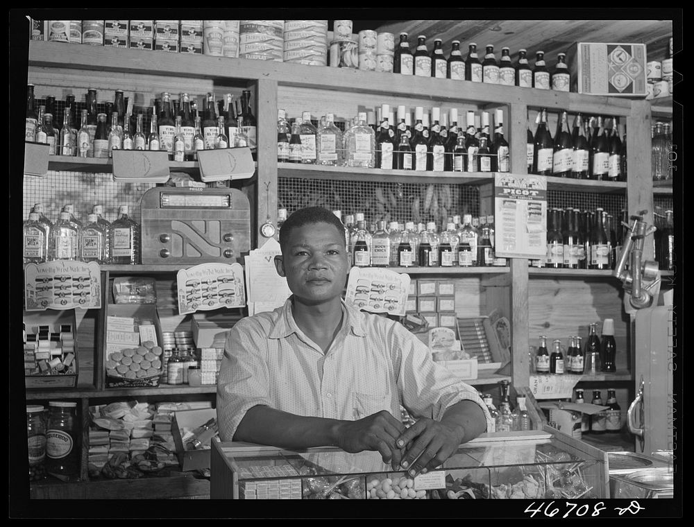 Bayamon, Puerto Rico (vicinity). Proprietor of a small general store, which will soon be evacuated because it is in an area…