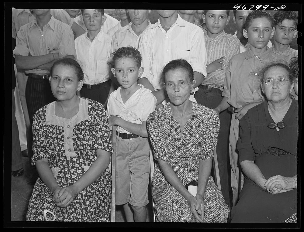 Corozal, Puerto Rico (vicinity). Farmers' wives and children listening to speeches at the tenant purchase celebration on a…
