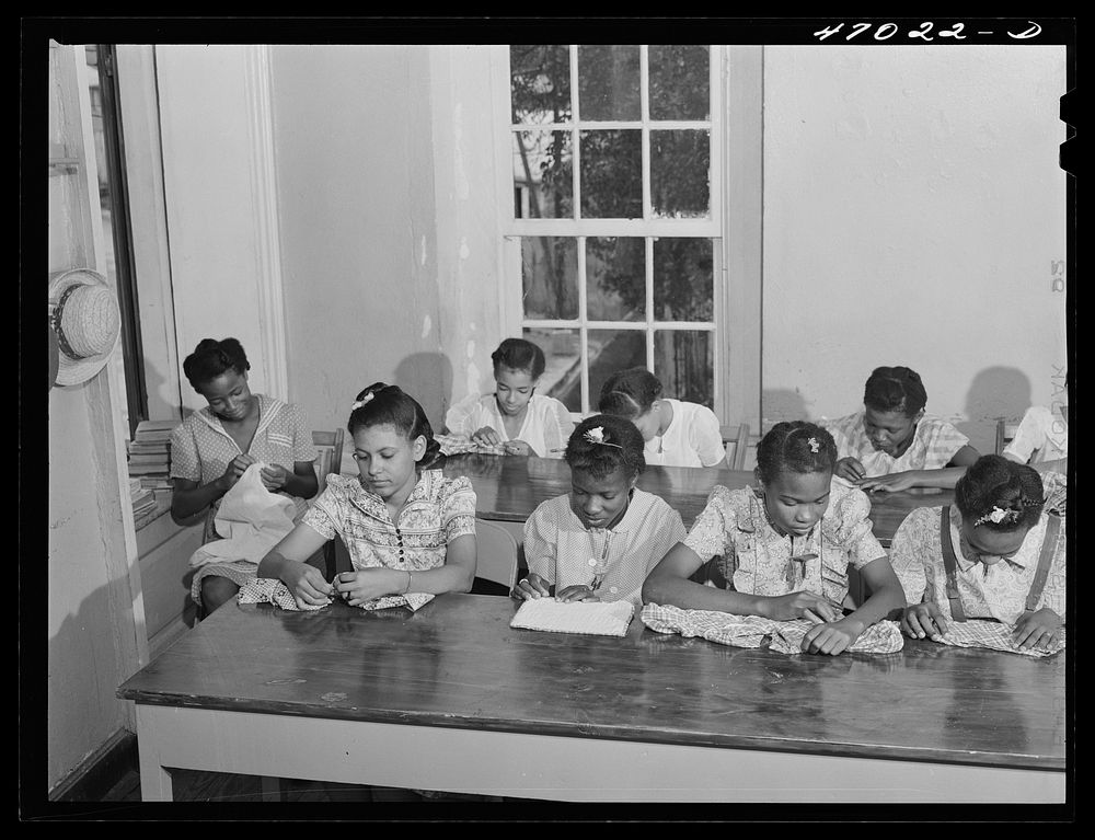 Christiansted, Saint Croix Island, Virgin Islands. Girls in sewing class in the Christiansted high school. Sourced from the…