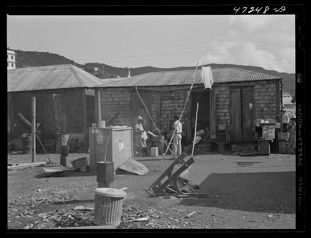 [Untitled photo, possibly related to: Charlotte Amalie, Saint Thomas Island, Virgin Islands. Washing clothes in a slum…