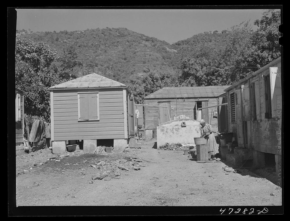Charlotte Amalie, Saint Thomas Island, Virgin Islands. Washing clothes on a side street. Sourced from the Library of…