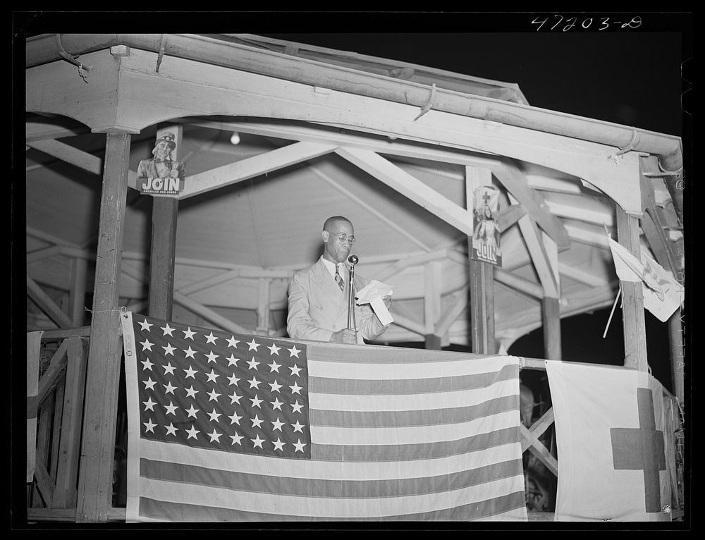 Charlotte Amalie, Saint Thomas Island, Virgin Islands. The master of ceremonies at the Red Cross meeting held in the square.…