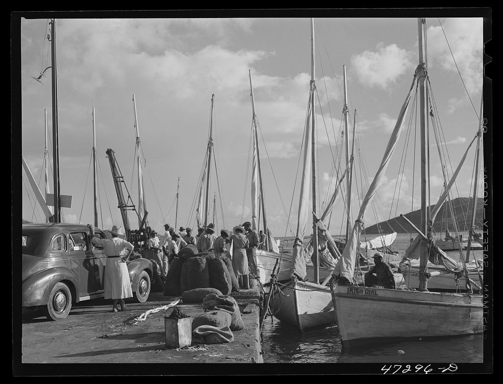 Charlotte Amalie, Saint Thomas Island, Virgin Islands. Fish and supply boats are tied up at Tortolla wharf. Sourced from the…