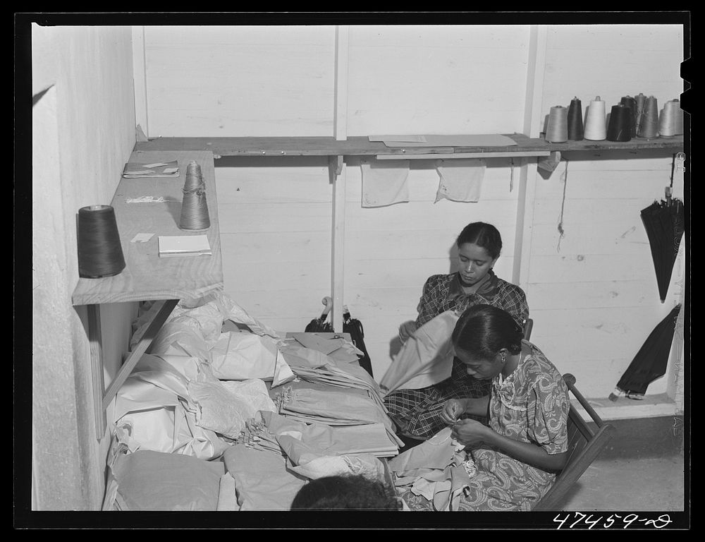 [Untitled photo, possibly related to: Santurce, Puerto Rico. Women working at the Rodriguez needlework factory. Minimum wage…