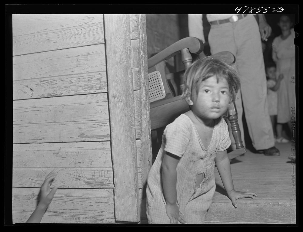 [Untitled photo, possibly related to: Guayanilla, Puerto Rico. Children of sugar workers living in the company houses behind…