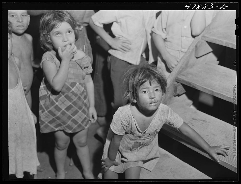 Guayanilla, Puerto Rico. Children of sugar workers living in the company houses behind the mill. Sourced from the Library of…