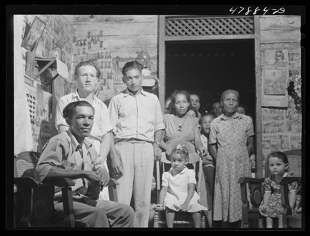 Guayanilla, Puerto Rico. Family of a sugar worker living in one of the company houses behind the mill. All these people live…