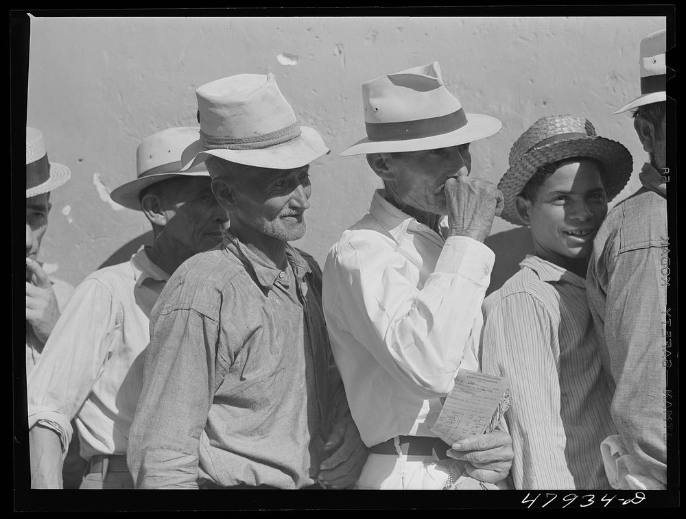 [Untitled photo, possibly related to: Cabo Rojo, Puerto Rico. Waiting in line at the surplus commodities office. Fatback and…