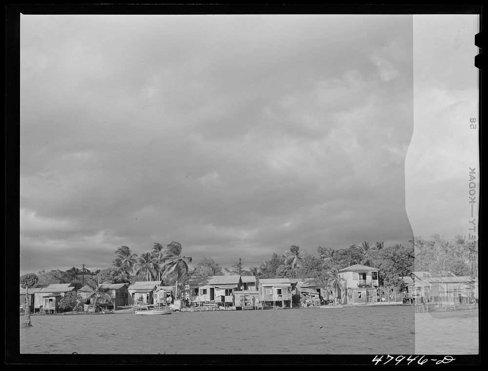[Untitled photo, possibly related to: Puerto Real, Puerto Rico. Part of the extremely poor little fishing village on the…