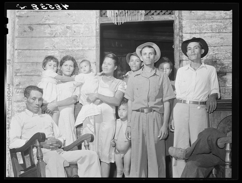 Guayanilla, Puerto Rico (vicinity). Sugar worker's family all living in this one house. Sourced from the Library of Congress.