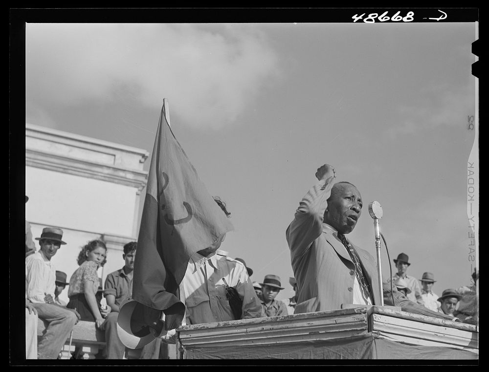 [Untitled photo, possibly related to: Yabucoa, Puerto Rico. Union leader speaking to strikers at a meeting in the plaza].…