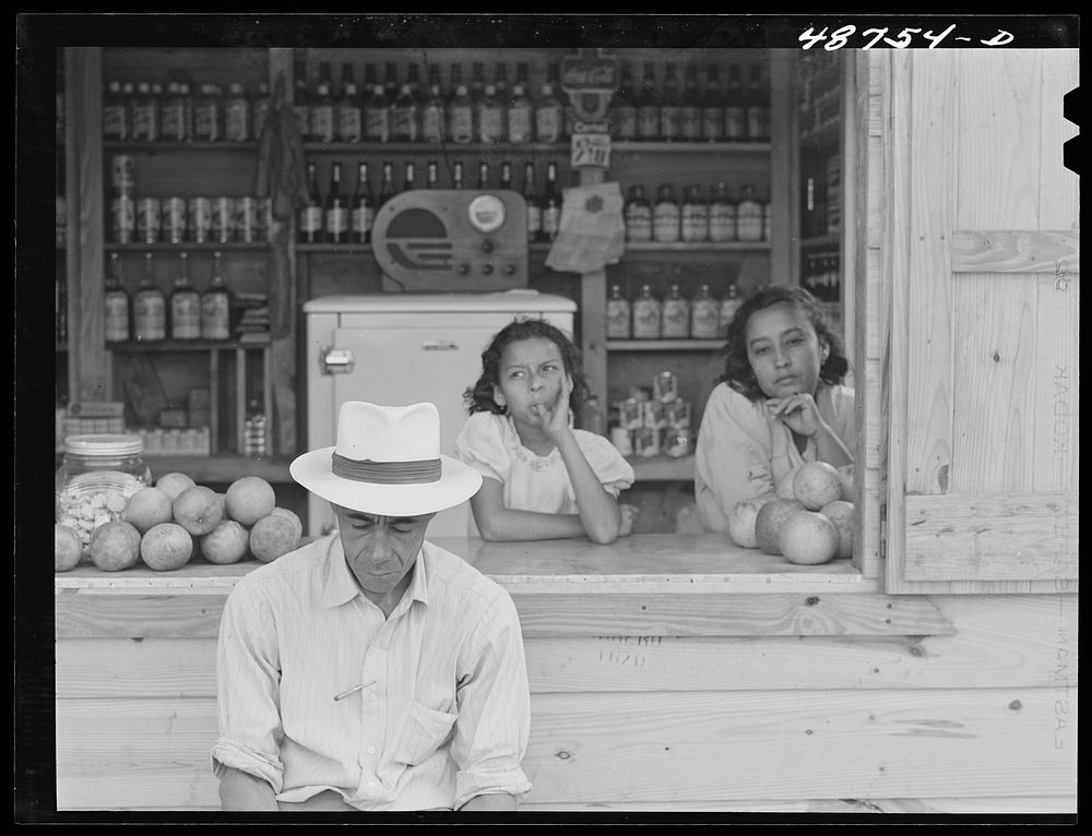 [Untitled photo, possibly related to: Bayamon, Puerto Rico. At a roadside store]. Sourced from the Library of Congress.