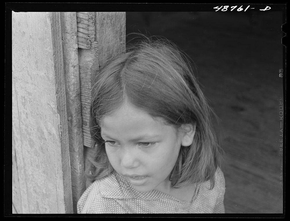 Cagus (vicinity), Puerto Rico. Daughter of a farm laborer. Sourced from the Library of Congress.