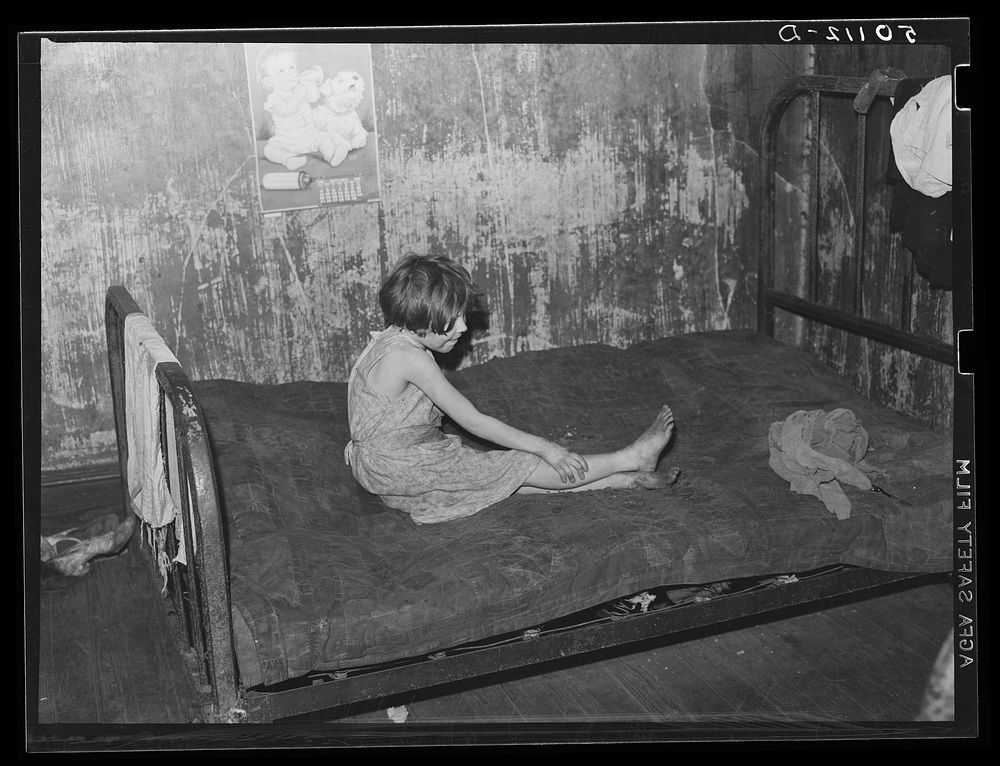 Child in miners boarding house. Mohegan, West Virginia. Sourced from the Library of Congress.