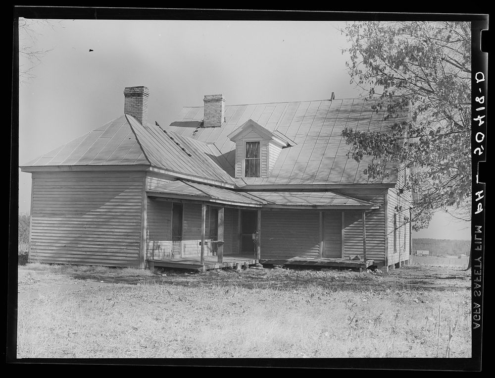 Rear view of old home purchased for rehabilitation client near Raleigh, North Carolina. Sourced from the Library of Congress.