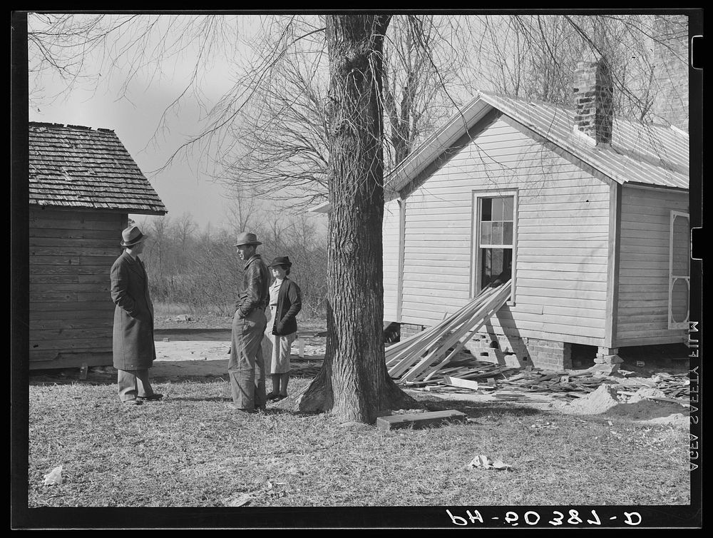 [Untitled photo, possibly related to: Rear view of home being remodeled for rehabilitation client, showing new addition on…