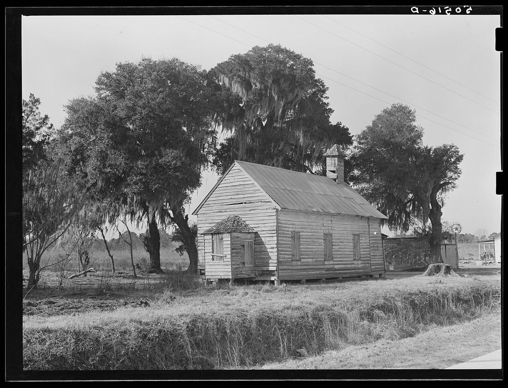 [Untitled photo, possibly related to: Schoolhouse in sawmill camp. Ashepoo, South Carolina]. Sourced from the Library of…