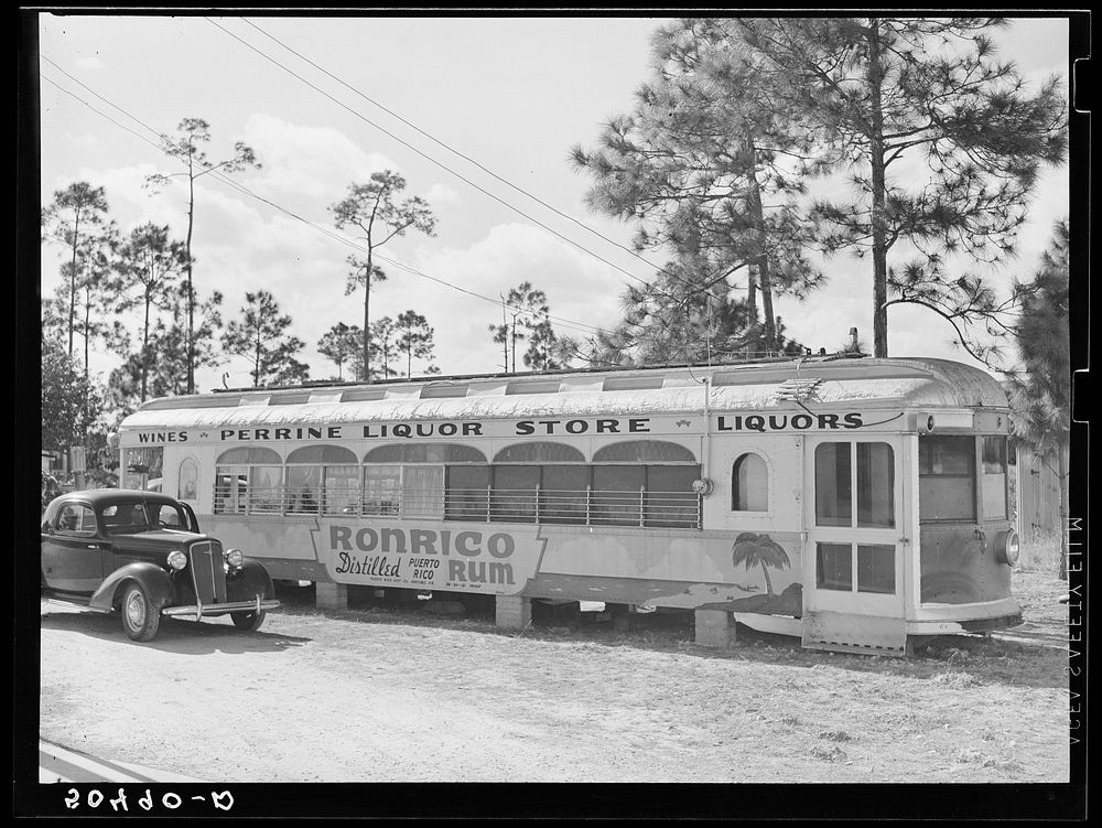 Old trolley car, now a liquor store, along highway near Perrine, Florida. Sourced from the Library of Congress.