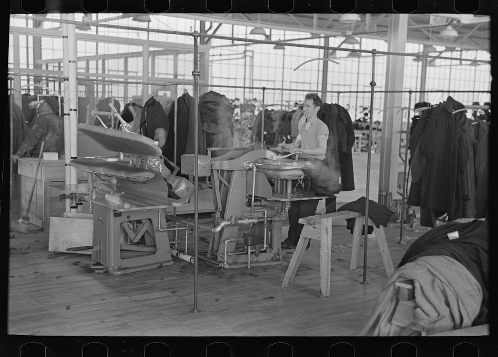 [Untitled photo, possibly related to: Pressers of work on women's coats in the cooperative garment factory at Jersey…