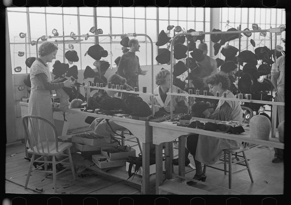 [Untitled photo, possibly related to: Homesteaders' daughters are employed in the millinery department of the cooperative…