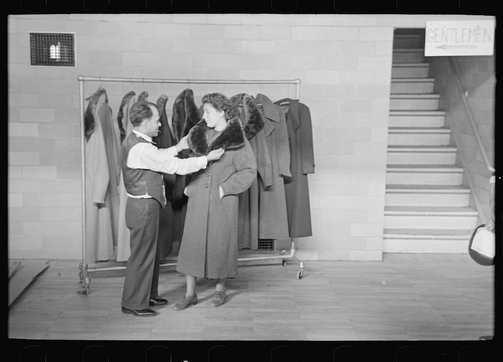 Measuring girl for a coat in cooperative garment factory at Jersey Homesteads, Hightstown, New Jersey by Russell Lee