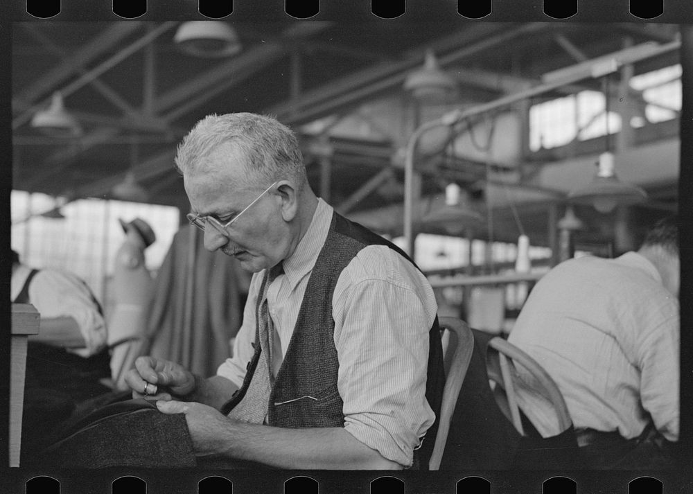 Eugene Isaacs, tailor, in the cooperative garment factory, Jersey Homesteads, Hightstown, New Jersey by Russell Lee