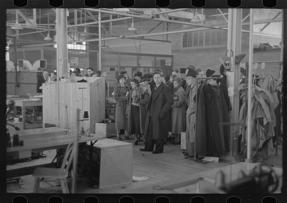 Visitors being shown through factory at the New Jersey Homesteads by Russell Lee