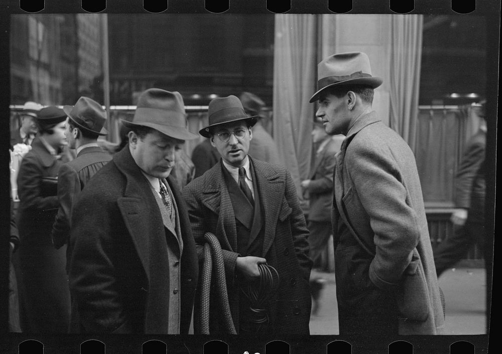 [Untitled photo, possibly related to: Two men in conversation, 7th Avenue near 38th Street, New York City] by Russell Lee